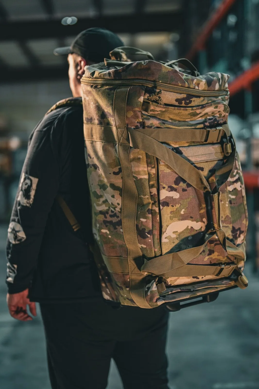 Olympus G4 carried as a ruck through a hangar