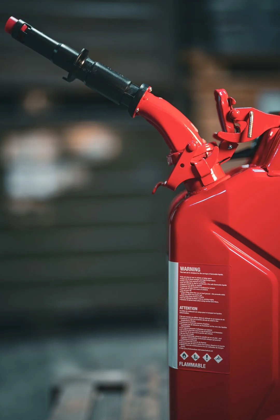 Wavian jerry can with the NATO safety spout locked in place and extended for pouring
